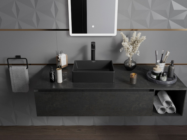 Mobile elegante sottolavabo nero nell'arredamento del bagno